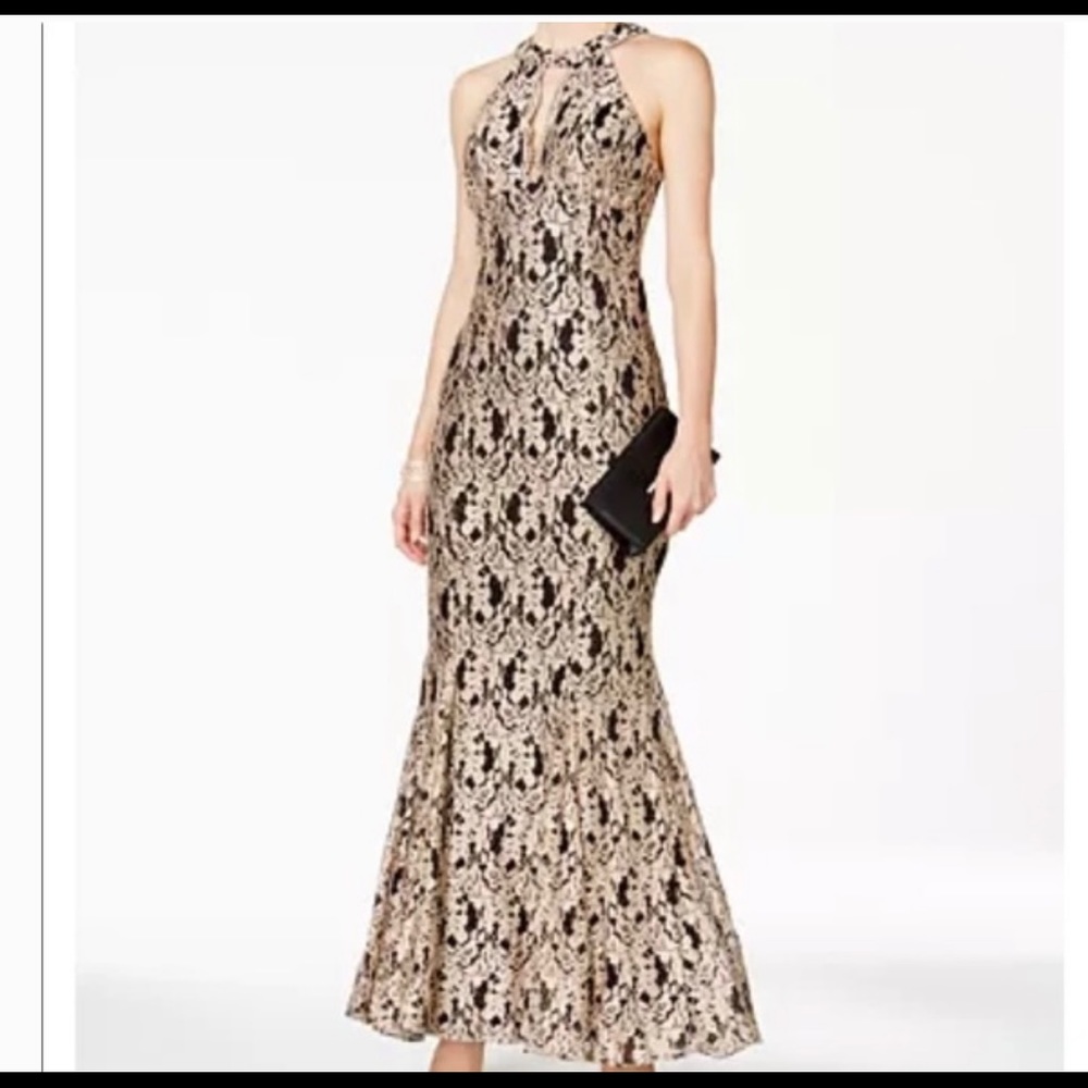 Brand new, with tags. Night way black and gold gown